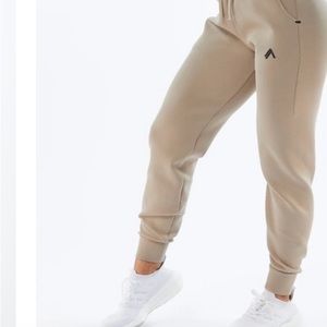 Alphalete ELMTS cuffed jogger in Tan